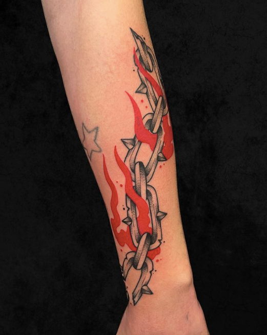 red and black chains and flames tattoo